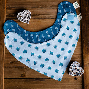 Blue baby bib with lotus flower print and blue baby bib with heart print