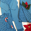 Load image into Gallery viewer, Blue baby clothing set with long sleeve onesie, one piece, and blanket with heart and leaf print