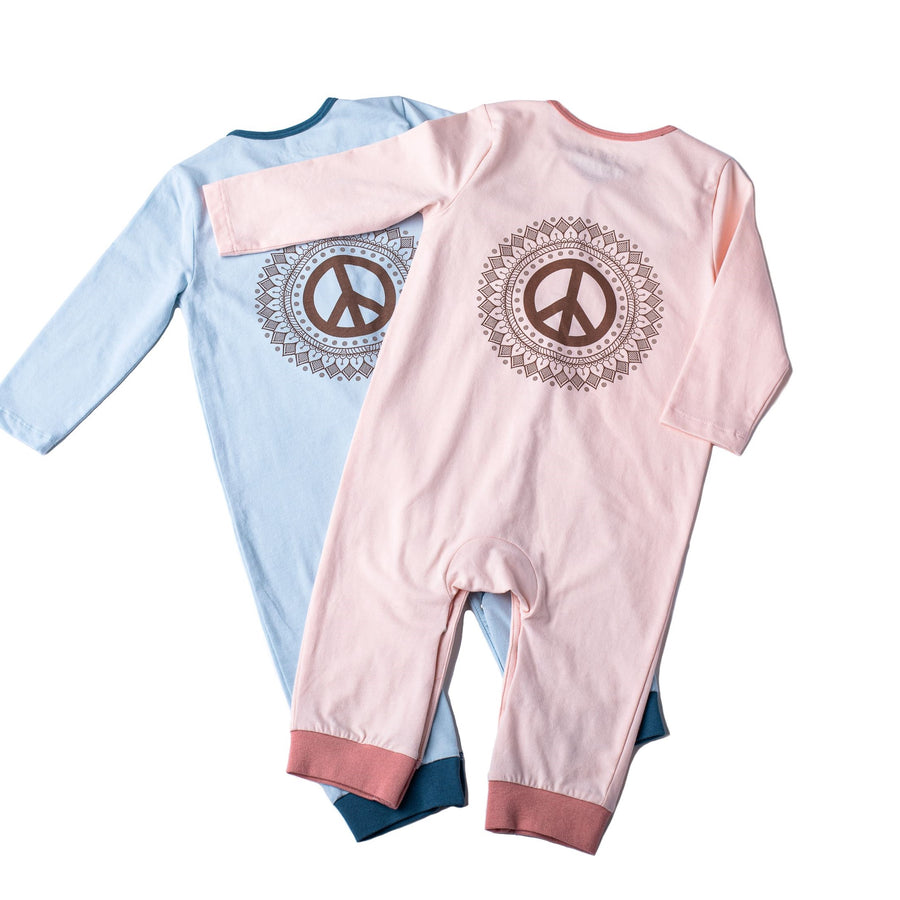 Baby one pieces in blue and pink with peace sign print