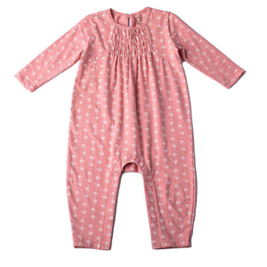 Pink one piece baby romper with small heart print