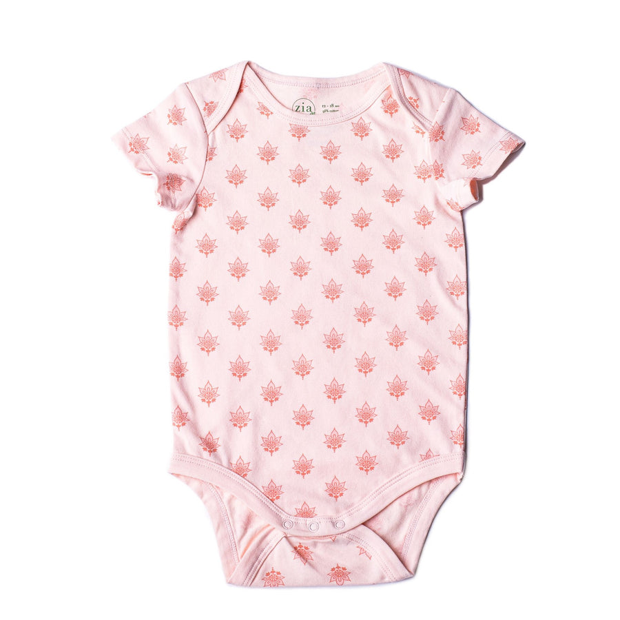 Pink short sleeve baby onesie with lotus flower print