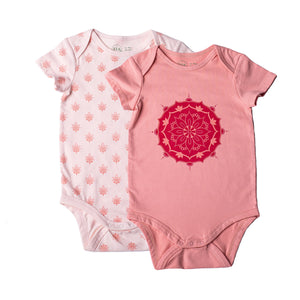 Pink short sleeve baby onesie with lotus flower print and pink short sleeve baby onesie with large mandala print